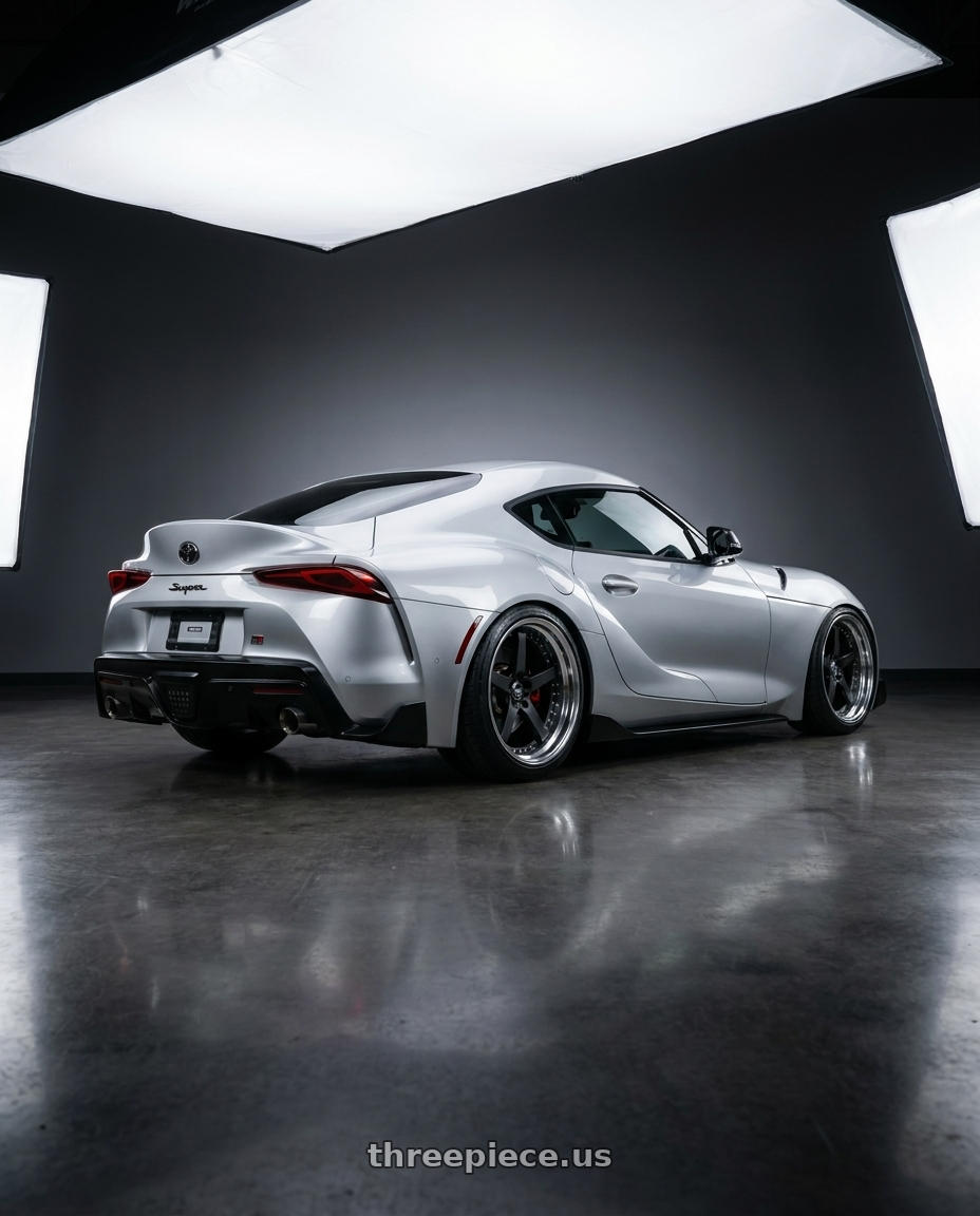 2020 gr supra premium with Work Equip E05 5x112 20x9.5+27 a disk Black Anodized wheels rear three quarter view square tires