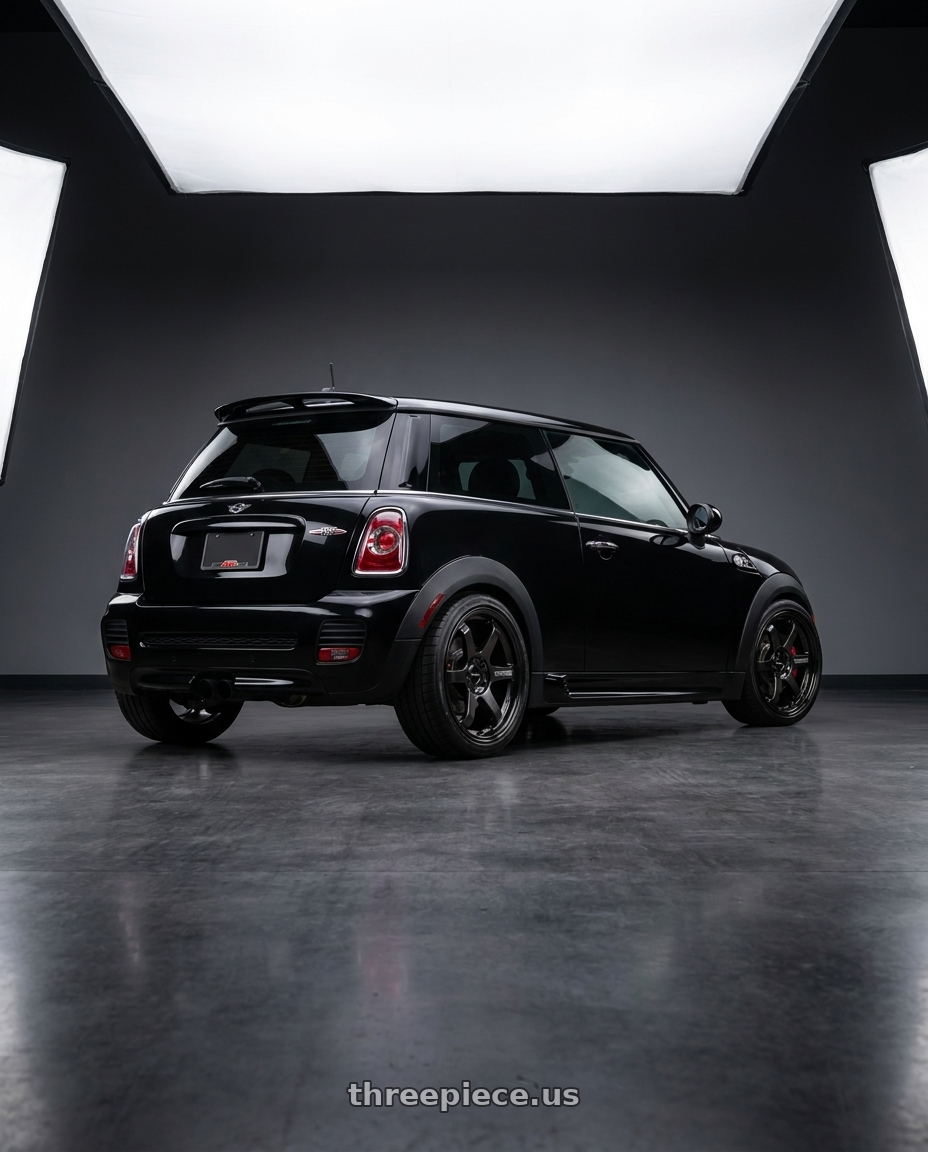 2013 Mini Cooper JCW with Volk Racing TE37 SONIC 4x100 16x6+42 wheels rear three quarter view square tires