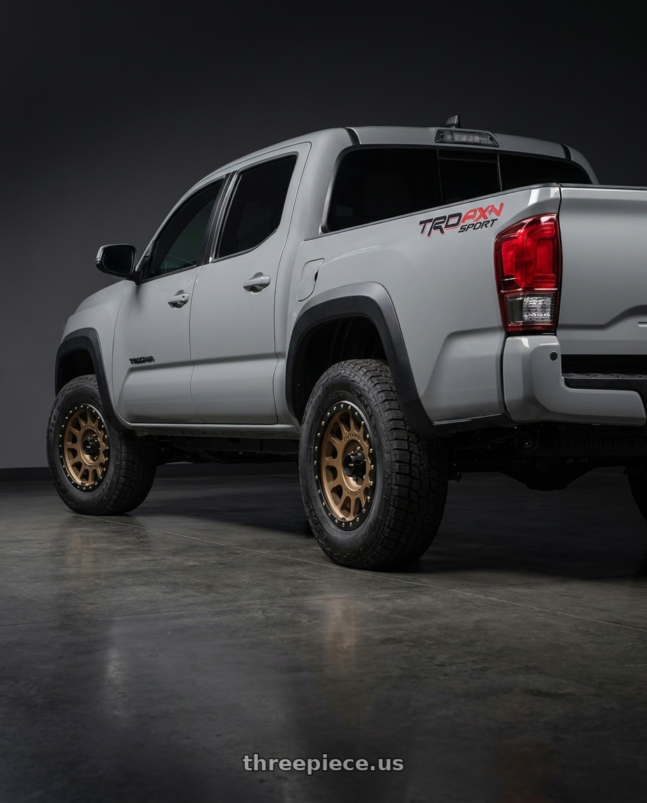 2021 Toyota Tacoma TRD Sport with Method Race Wheels 305BZ NV 6x139.7 18x9 -12 METHOD BRONZE wheels rear three quarter view square tires