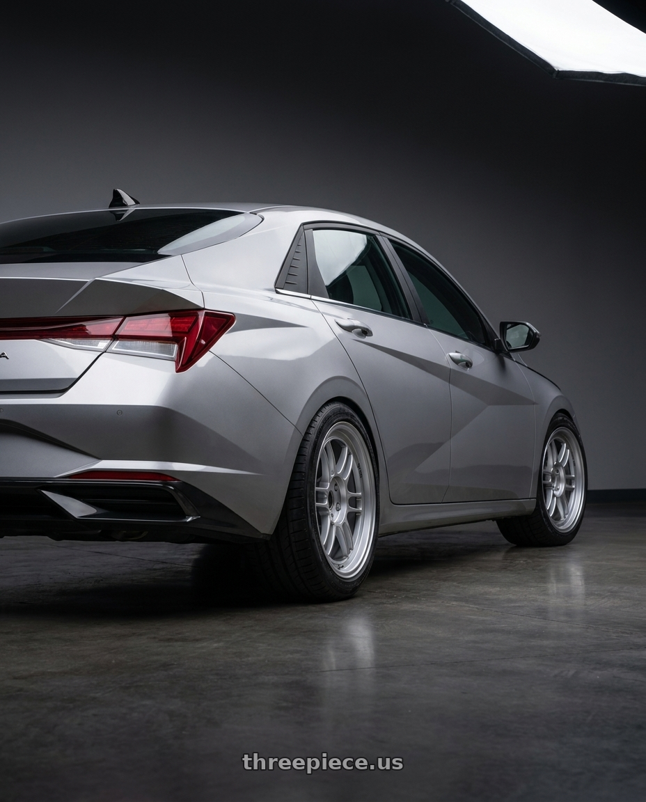 2021 Hyundai Elantra Limited with Enkei RPF1 5x114.3 18x8.5+40 Silver wheels rear three quarter view square tires
