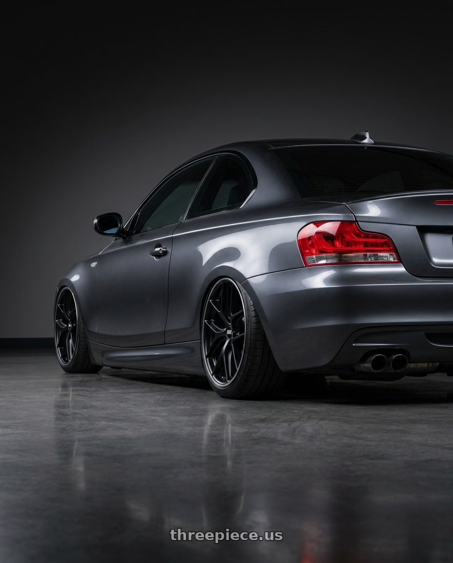 2012 BMW 1 Series E82 with BBS CC-R 5x120 19x9.0+48 Satin Black wheels rear three quarter view slight stretch tires