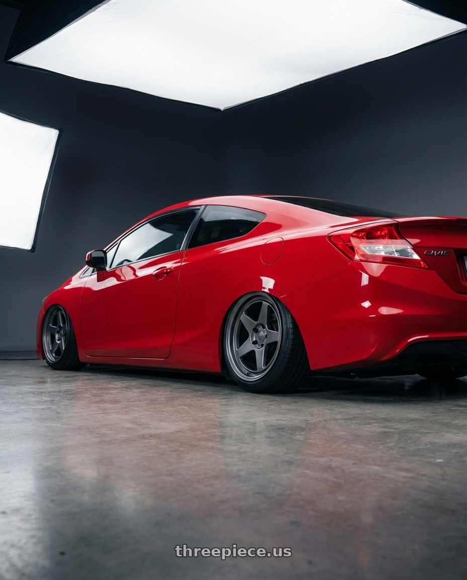 2011 Honda Civic Si with Kansei K12G KNP 5x114.3 18x10.5 12 Gunmetal wheels rear three quarter view slight stretch tires