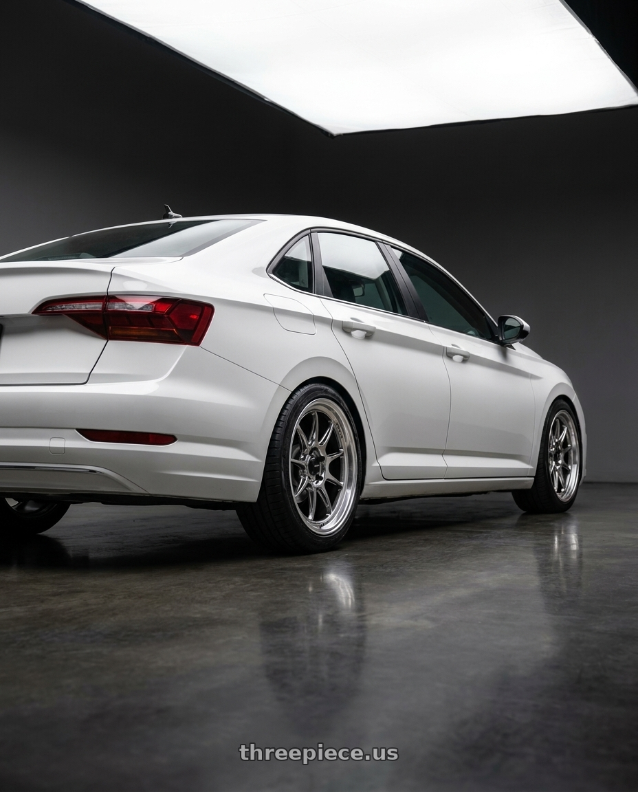 2023 volkswagen jetta sport with Konig Countergram 5x112 18x8.5+43 Hyper Chrome / Machined Lip wheels rear three quarter view square tires