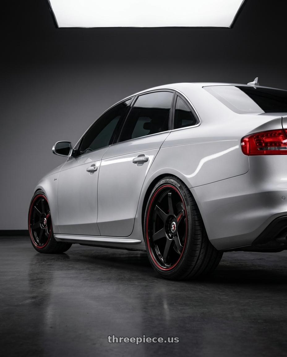 2012 Audi S4 with Spec-1 SPT-33 5x112 19x8.5 +38 Gloss Black & Red Line wheels rear three quarter view square tires