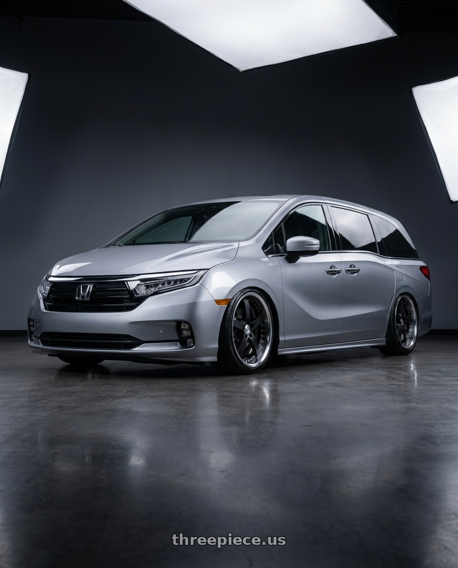 2024 Honda Odyssey Elite with Work Equip E05 5x120 20x8+44 o disk Black Anodized wheels front three quarter view slammed stance