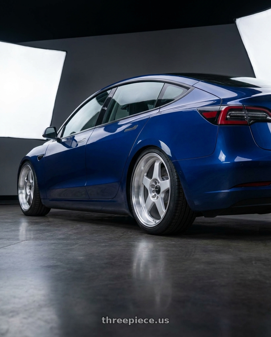 2023 Tesla model 3 with Vors SP1 5x100/5x114.3 17x8  +35 Silver Machine Face Lip wheels rear three quarter view square tires