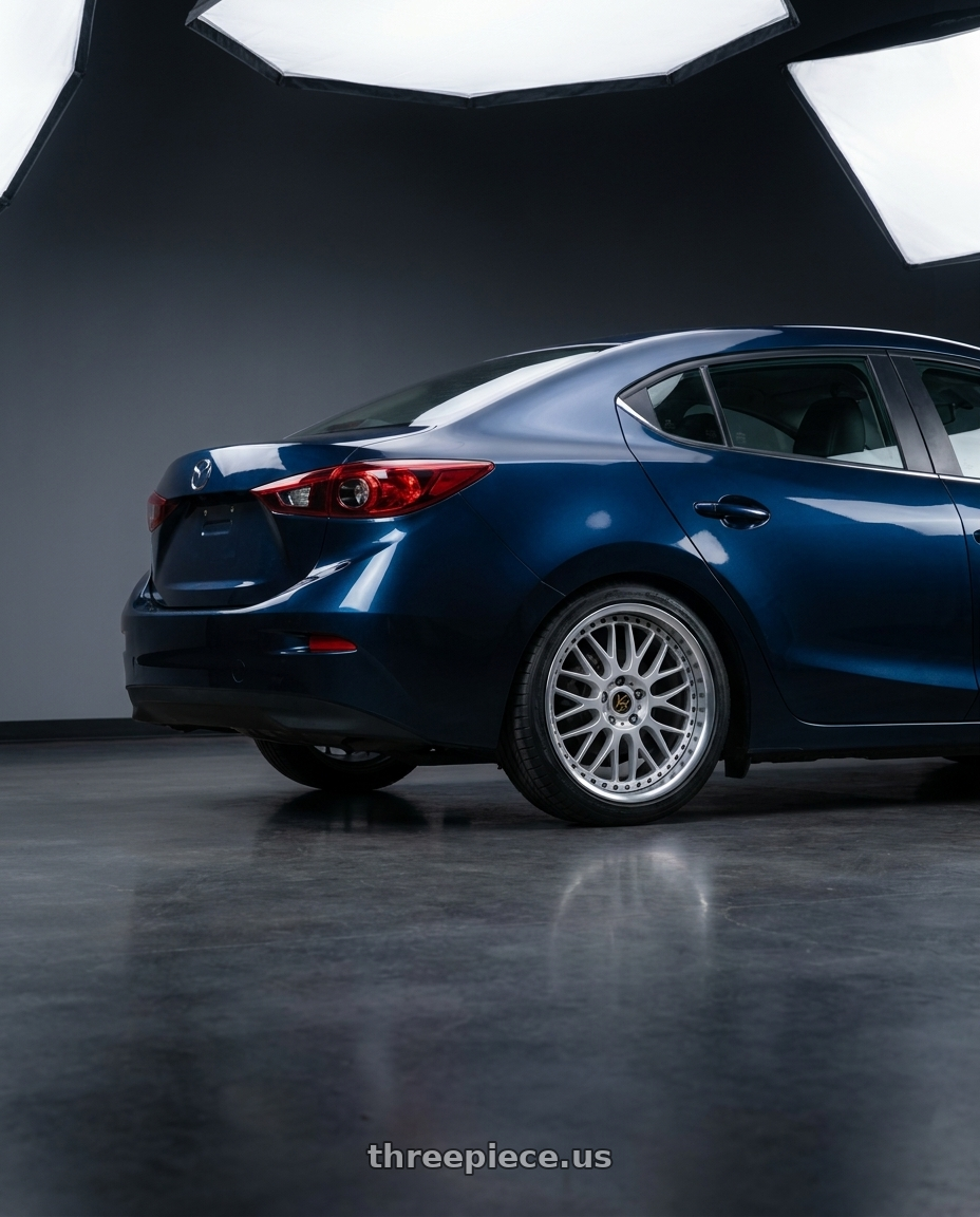 2017 mazda 3 sedan with Work Vs-Xx 5x100 18x7+51 A Disk Light Grey Silver wheels rear three quarter view square tires