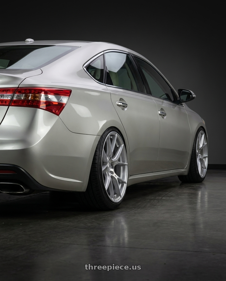 2013 toyota avalon with Aodhan AH-11 5x114.3 18x8.5+35 Gloss Silver Machined Face wheels rear three quarter view extreme stretch tires