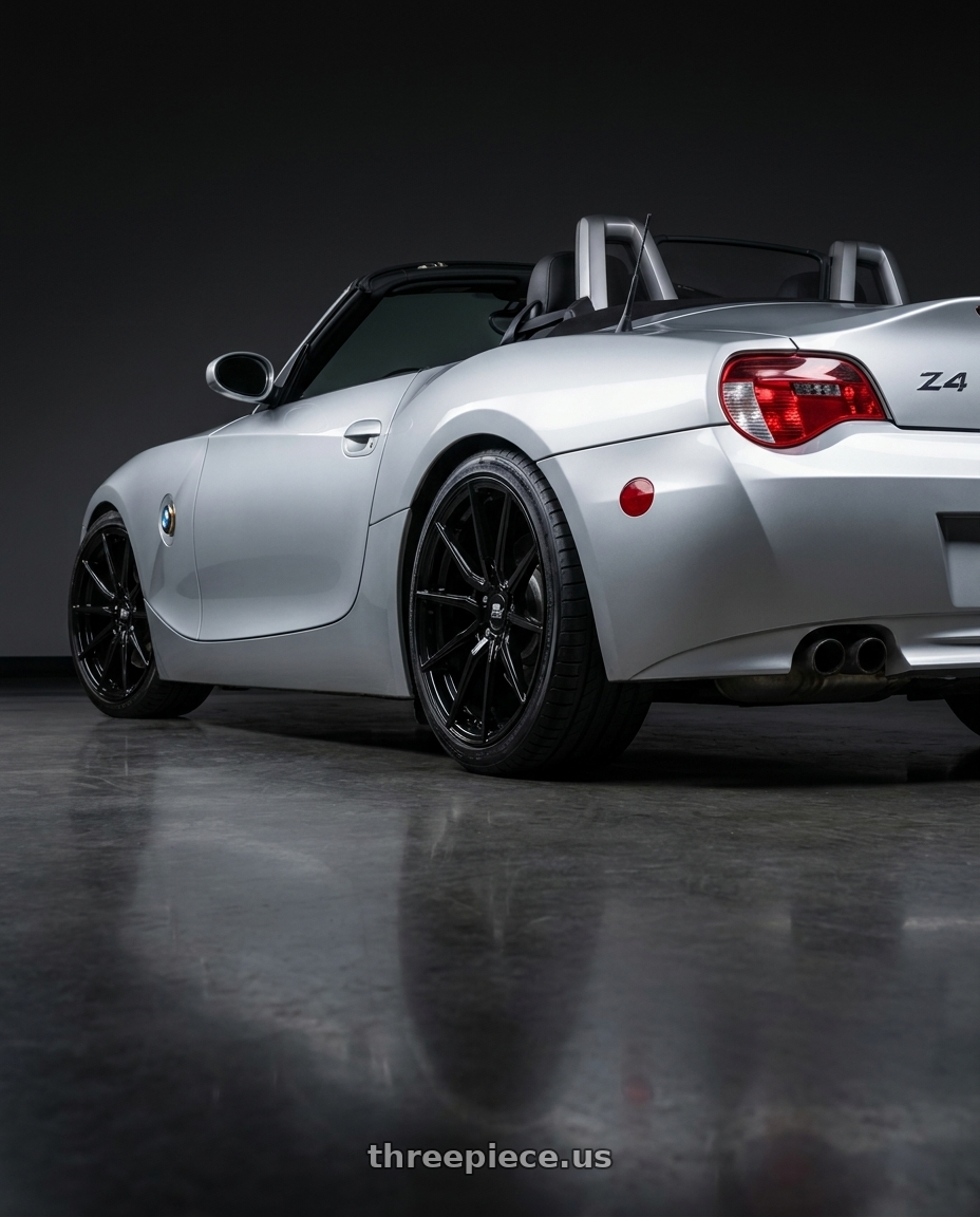 2005 Bmw Z4 with MST Wheels DELTA 5X112 18X8.5 +43 Glossy Black wheels rear three quarter view square tires