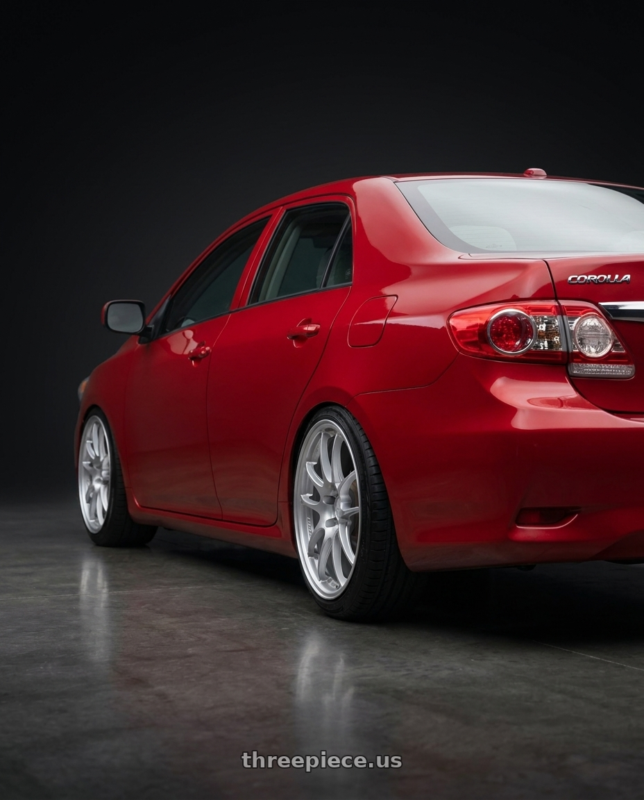 2010 Corolla 18 with Enkei PF01 5x100 17x8+35 Silver wheels rear three quarter view slight stretch tires