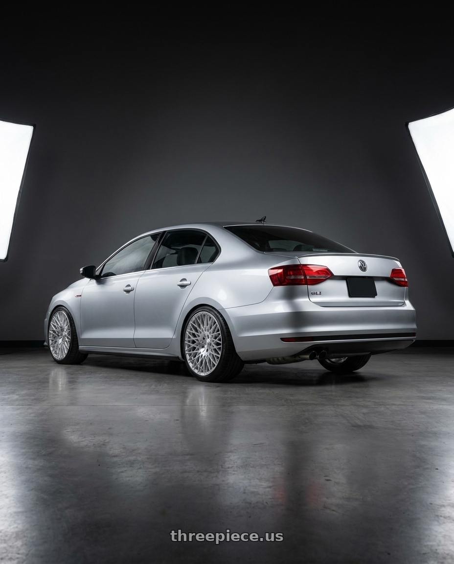 2016 Volkswagen Jetta GLI MK6 with Avant Garde Wheels M540 5X112 18x9 +48 Silver Machined wheels rear three quarter view square tires