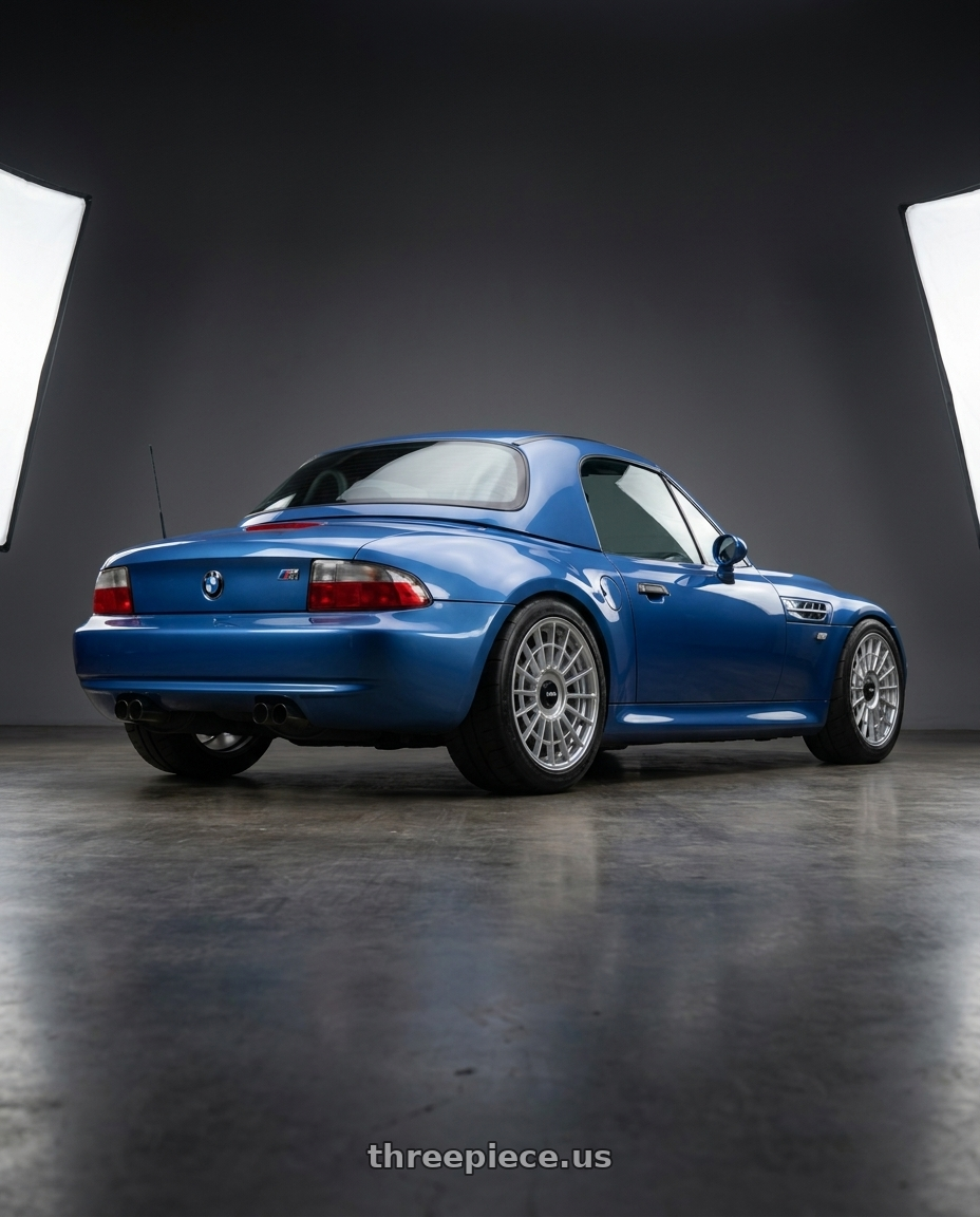 2002 BMW Z3M with Rotiform 1PC R134 FLG 5X120 18X8.5 +35 GLOSS SILVER wheels rear three quarter view meaty tires