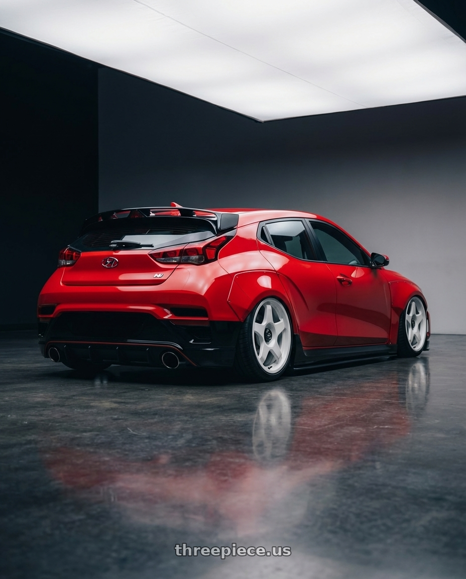 2022 Hyundai Veloster N with fifteen52 CHICANE 5x114.3 / 5x120 19x8.5 +35 RALLY WHITE (GLOSS WHITE) wheels rear three quarter view slight stretch tires