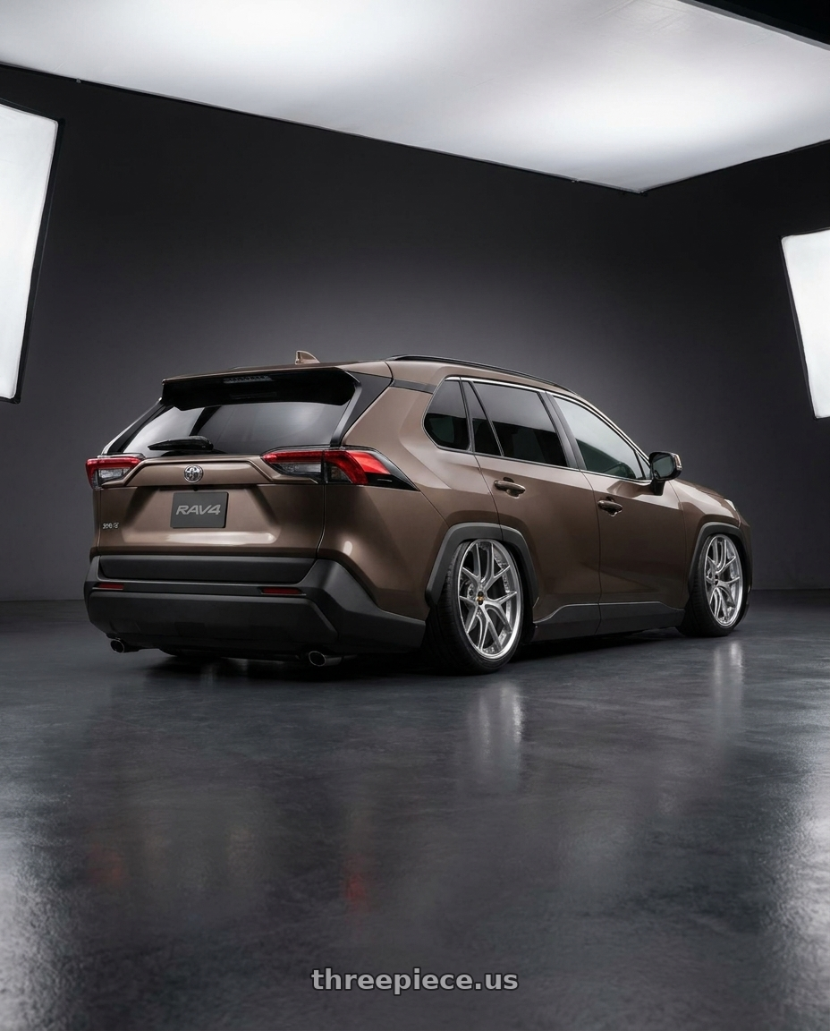 2026 Toyota Rav4,Brown with BBS RI-S 5x120 20x9 +25 Diamond Sliver wheels rear three quarter view slight stretch tires