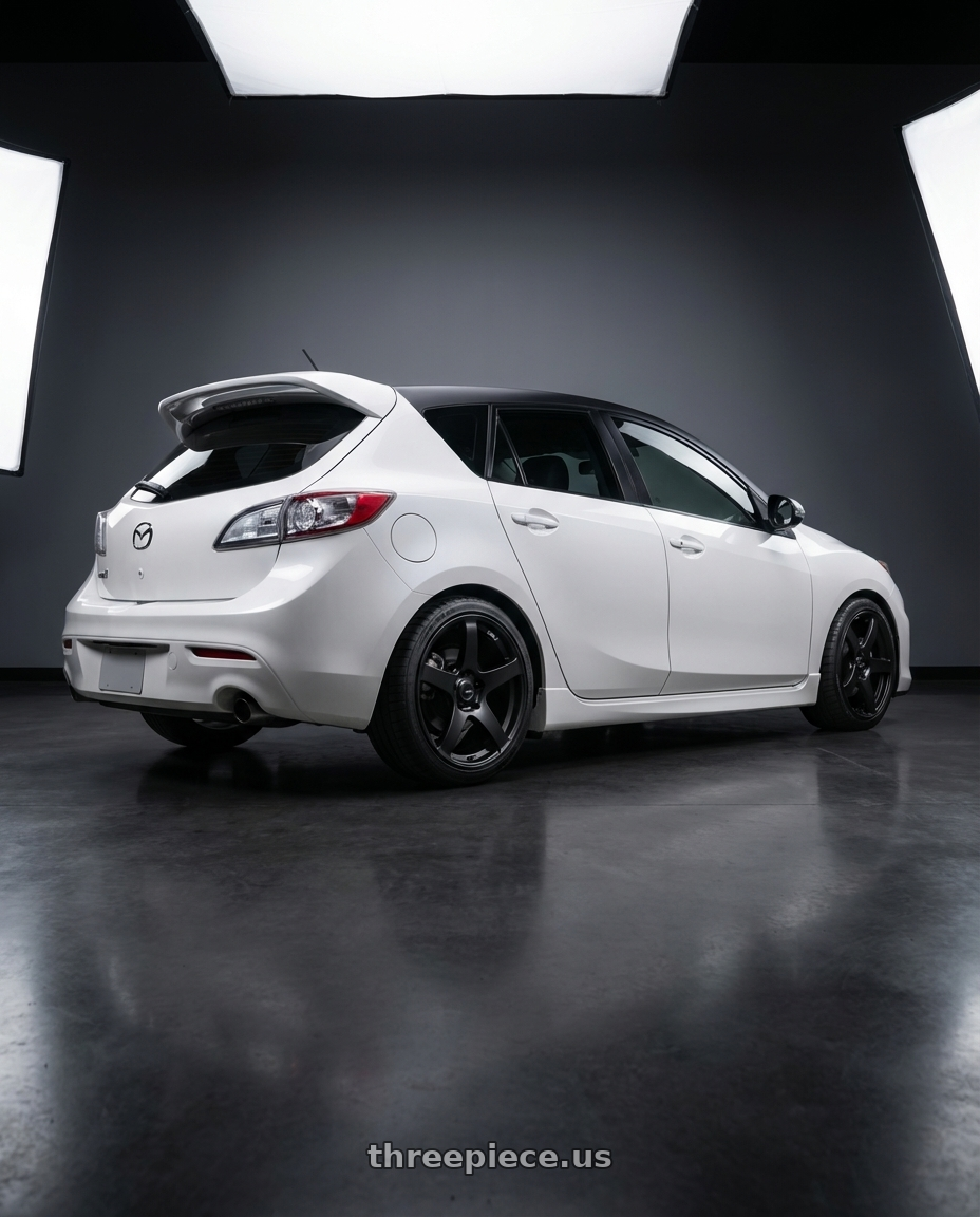 2012 Mazda Mazdaspeed3 with Ssr Gtv01 5x114.3 18x8+35  FLAT BLACK wheels rear three quarter view square tires
