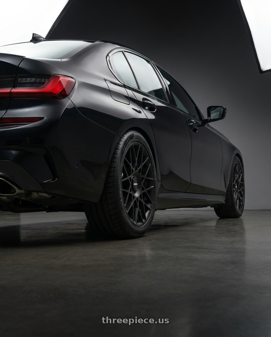 2021 BMW M340i with Rotiform 1PC R165 BLQ-C 5X112 19X8.5 +45 MATTE BLACK wheels rear three quarter view meaty tires