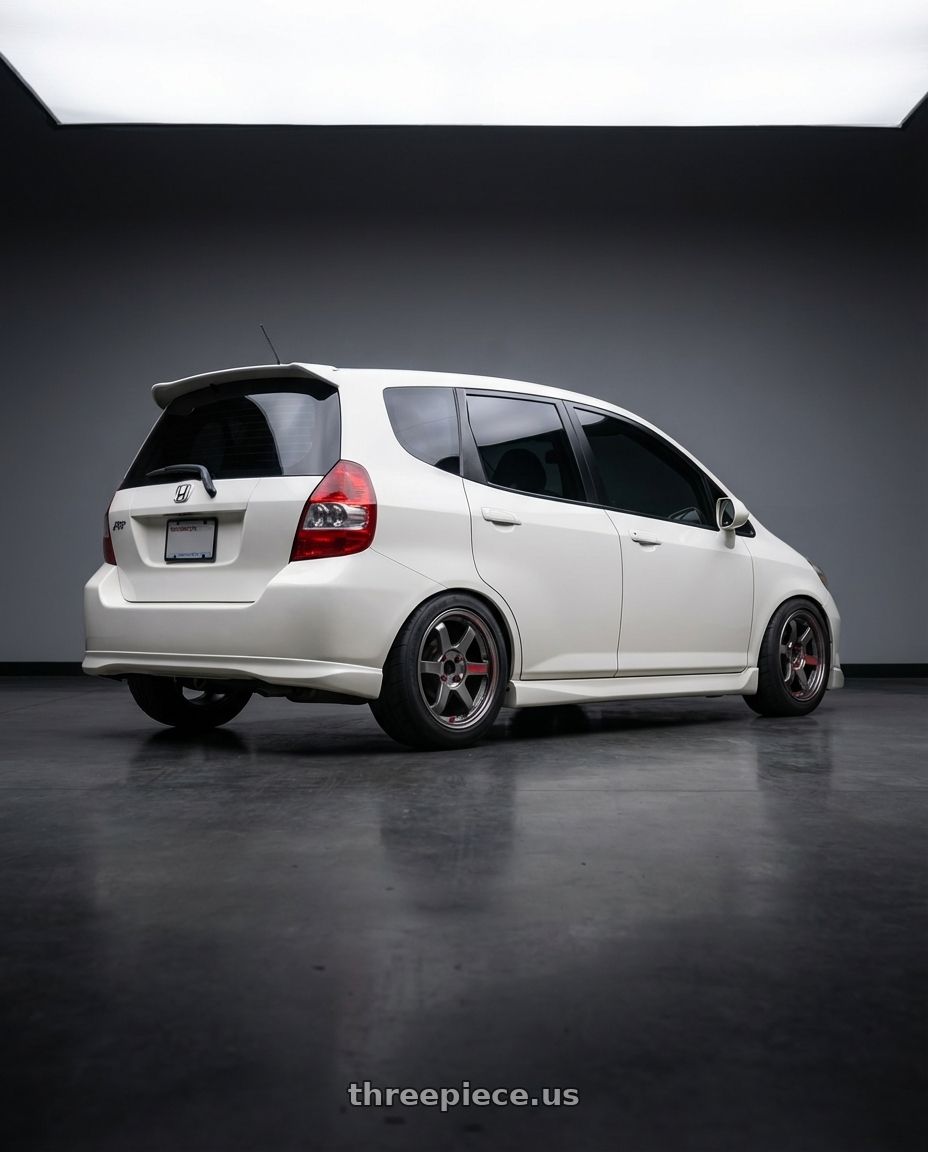 2007 Honda fit  with Volk Racing TE37 Sonic SL 4x100 15x7.0+34 wheels rear three quarter view meaty tires