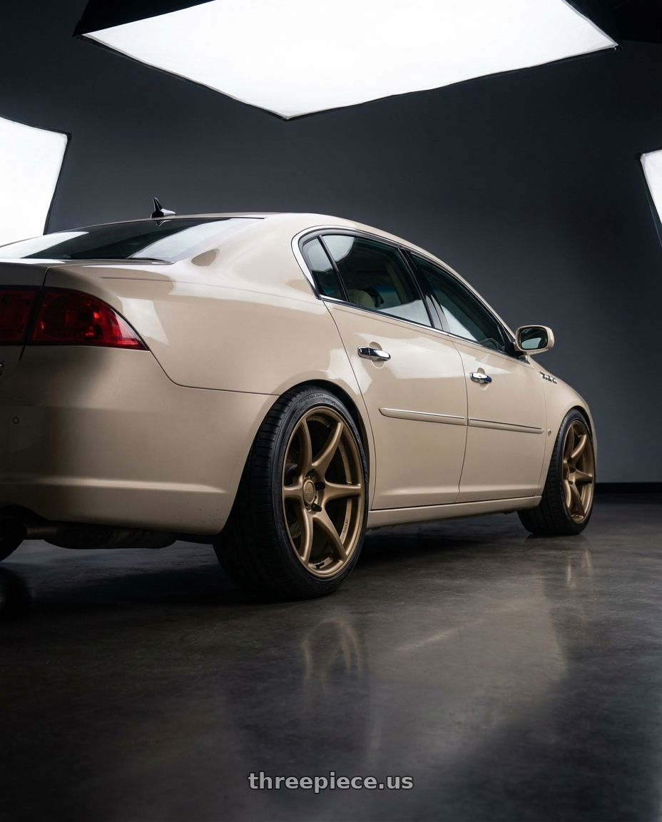 2009 Buick LeCerne, biege with Kansei K11B Tandem 5x114.3 18x8.5 35 Bronze wheels rear three quarter view square tires