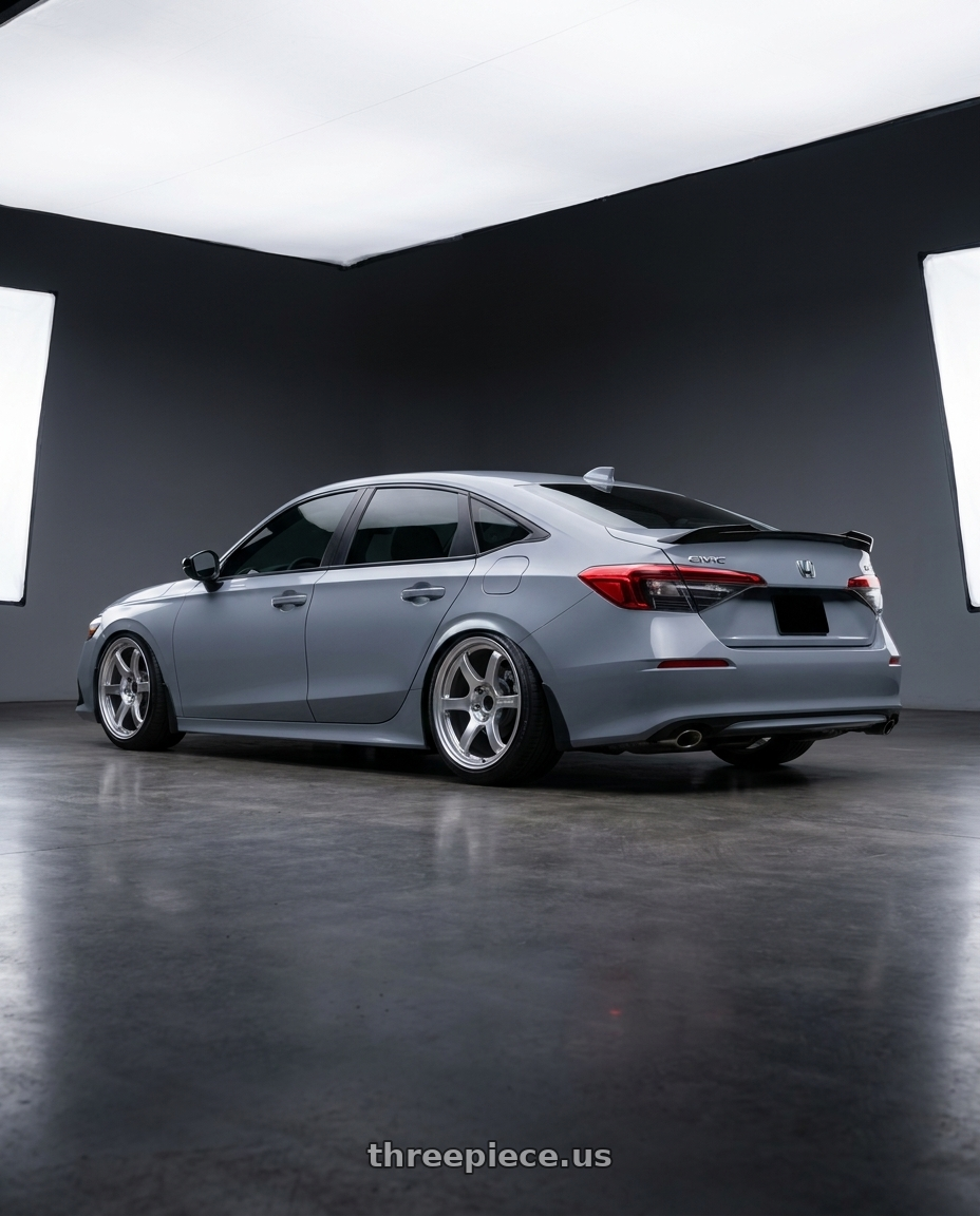 2026 Honda civic si with Gram Lights 57DR 5x114.3 18x9.5+38 Grace Silver wheels rear three quarter view slight stretch tires