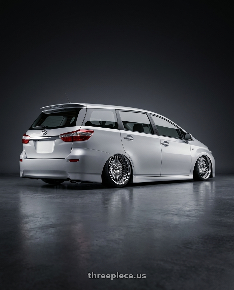 2010 Taiwan Toyota Wish with Work Emitz Black Polish 5x100 19x7.5 +22 wheels rear three quarter view slight stretch tires