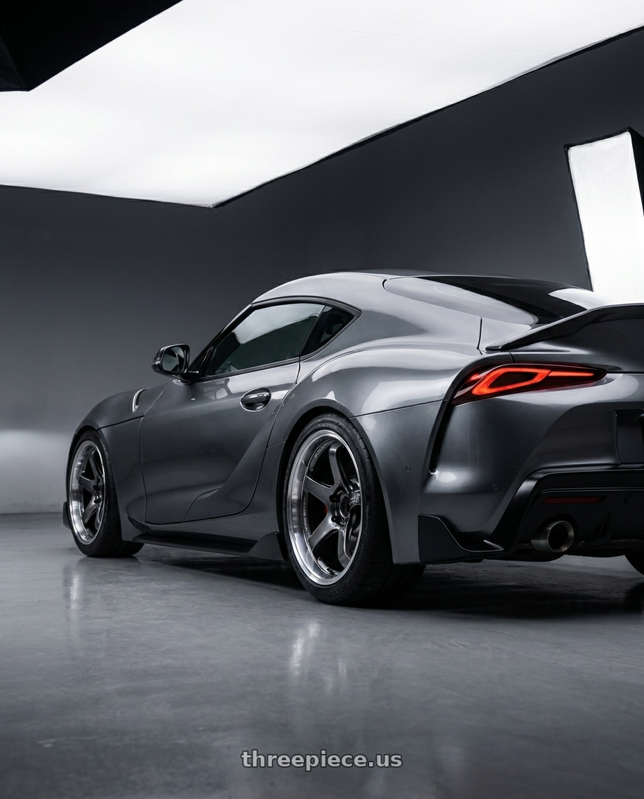 2023 toyota supra with Advan Racing GT BEYOND 5x114.3 19x8.5 +37 MACHINING & HYPER PLATINUM BLACK wheels rear three quarter view square tires