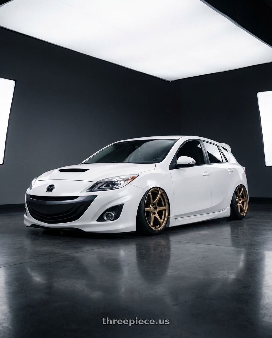 2012 Mazda Mazdaspeed3 with Kansei K11B Tandem 5x114.3 18x9.5 22 Bronze wheels