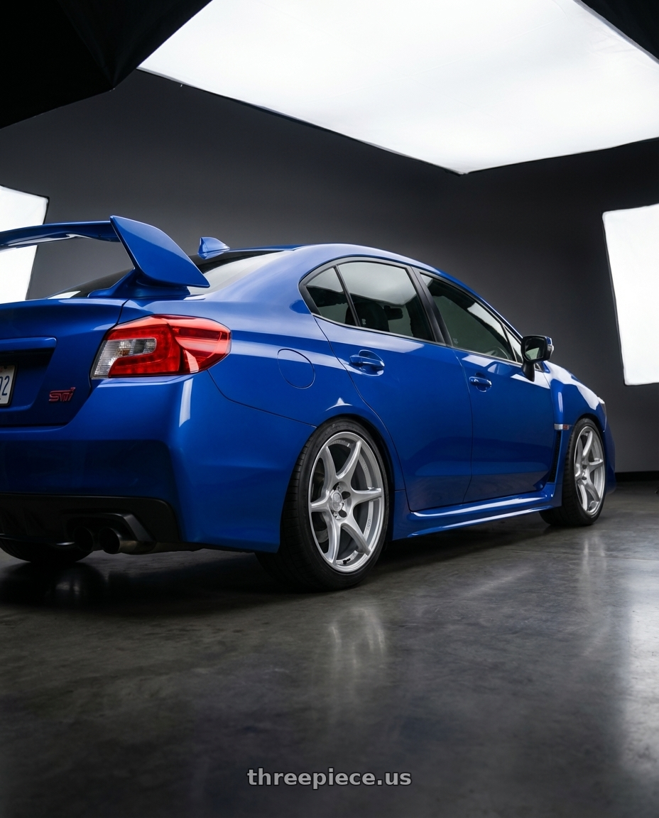 2013 Subaru WRX STI with Kansei K11S Tandem 5x114.3 18x8.5 35 Hyper Silver wheels rear three quarter view square tires
