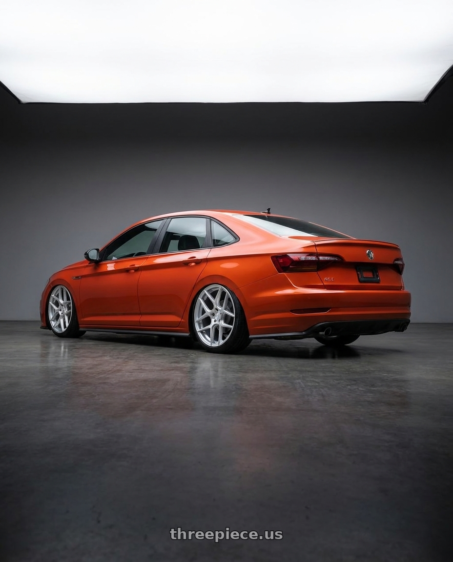 2023 Volkswagen Jetta GLI MK7 with Aodhan AFF2 5x112 19x9.5+35 Gloss Silver Machined Face wheels rear three quarter view slight stretch tires