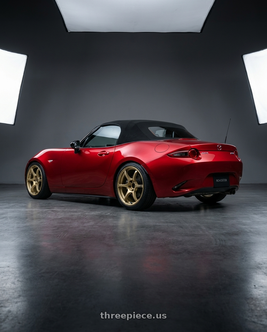 2025 mazda mx5 nd3 soft top with Advan RGIII 4x100 17x7.0+47 Gold wheels rear three quarter view slight stretch tires
