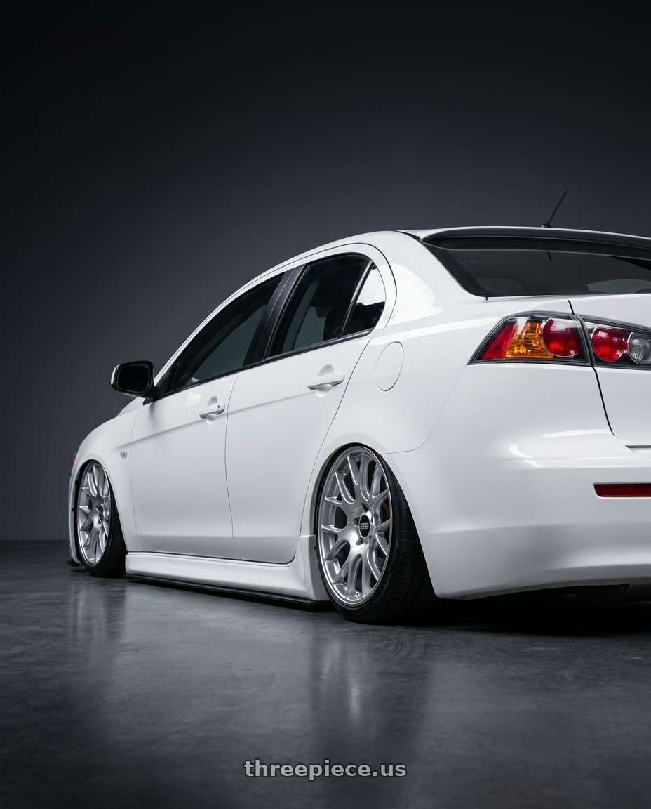 2022 Grand lancer with BBS CH-R 5x114.3 20x8.5 +38 Brilliant Silver Polished Rim Protector wheels rear three quarter view slight stretch tires