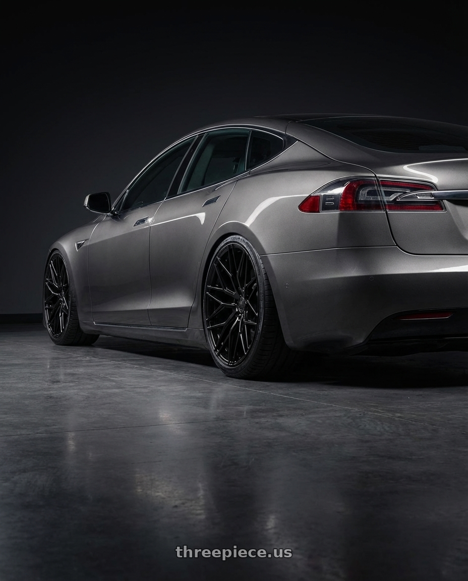 2018 Tesla Model S with Avant Garde Wheels M520R 5X120 21x12 +52 Gloss Black wheels rear three quarter view slight stretch tires