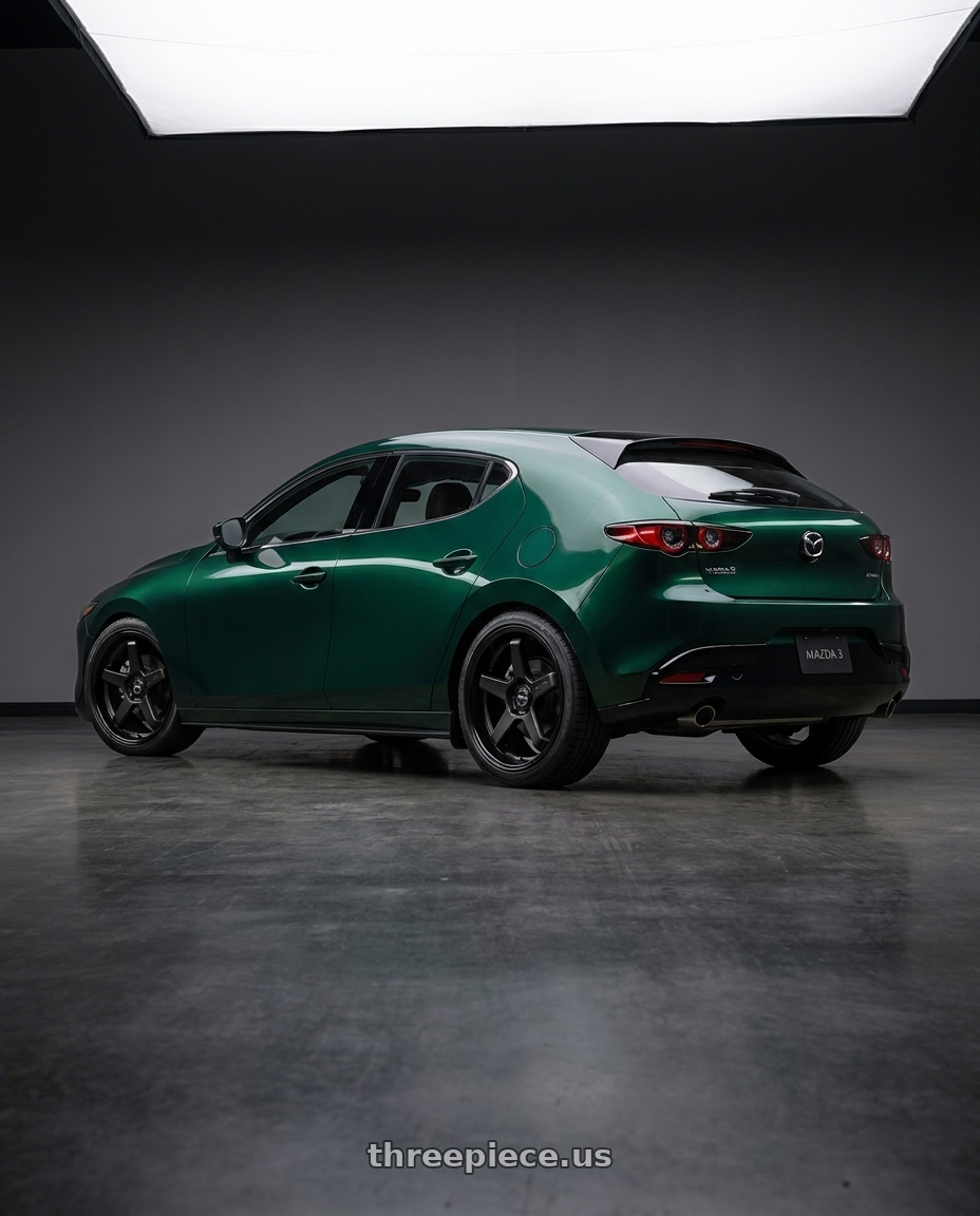 2026 Mazda 3 with F1R FC5 5x114 18x8.5 +38 Matte Black/Gloss Black Lip wheels rear three quarter view square tires