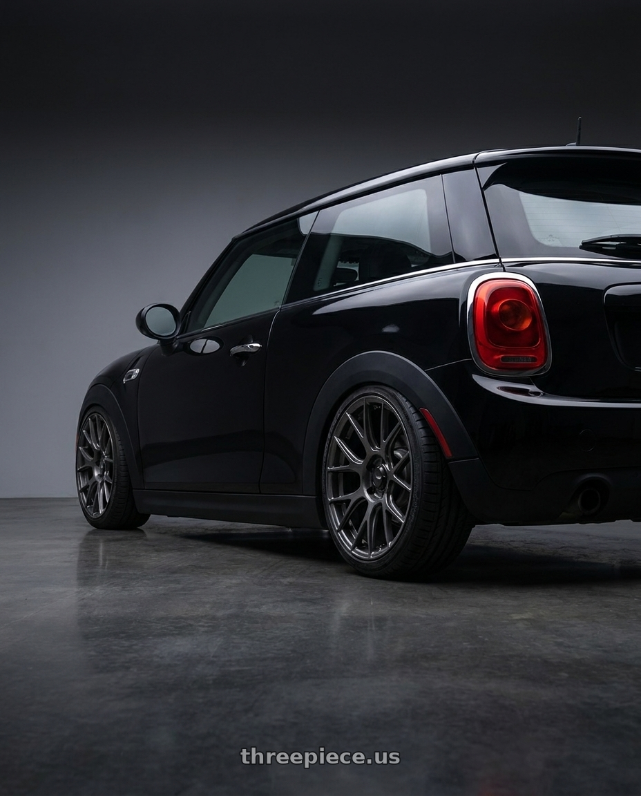 2018 mini cooper f56 base model with Konig Ampliform 5x120 20x8.5+45 Dark Metallic Graphite wheels rear three quarter view square tires