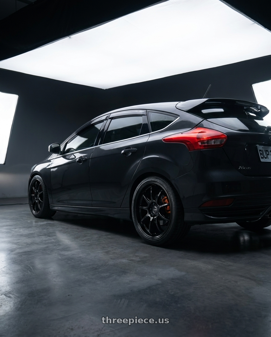 2018 Ford Focus MK3.5 Work D9R with Work Emotion D9r 5x108 18x8.5 +38 Black wheels rear three quarter view square tires