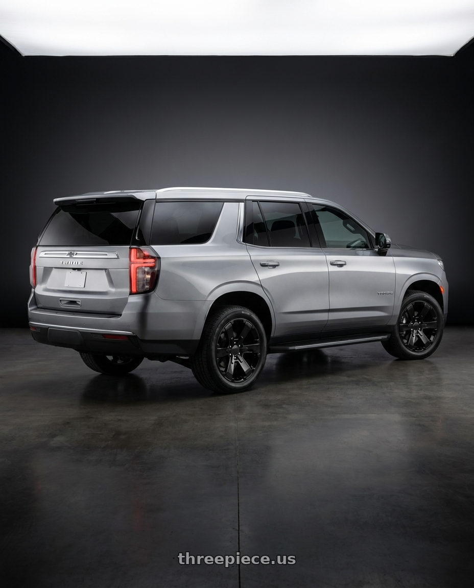 2024 Chevy tahoe with OE Wheels CV41B 6x139.7 22x9+24 Gloss Black wheels rear three quarter view square tires