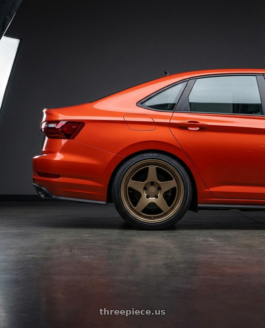 2023 Volkswagen Jetta GLI MK7 with Kansei K12B KNP 5X112 18x8.5 35 Bronze wheels rear three quarter view square tires