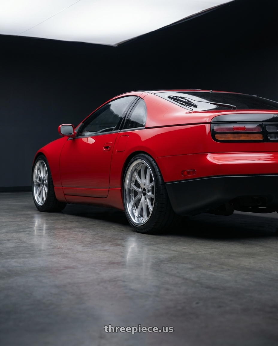 1990 nissan 300zx with ARC AR5 5x114.3 18x9.5  +30 Silver Machine Face Lip Chrome Rivet wheels rear three quarter view square tires