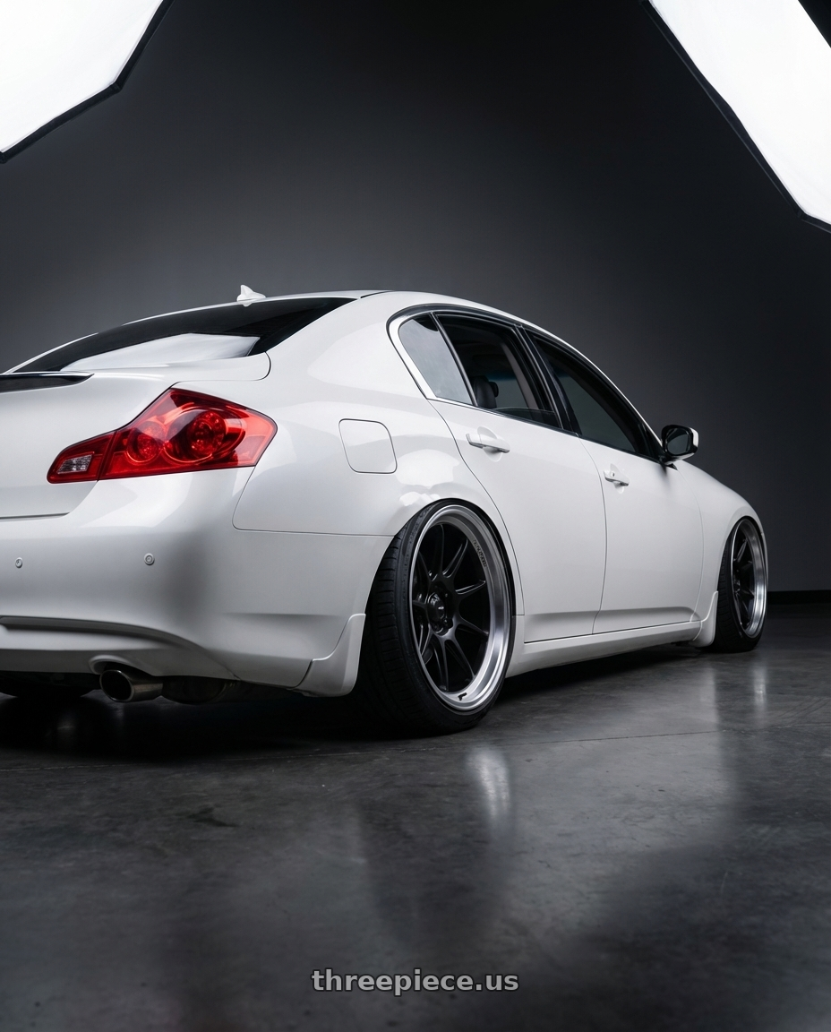 2012 Infiniti G37 with Konig Countergram 5x114.3 19x11+18 Matte Black / Matte Machined Lip wheels rear three quarter view slight stretch tires