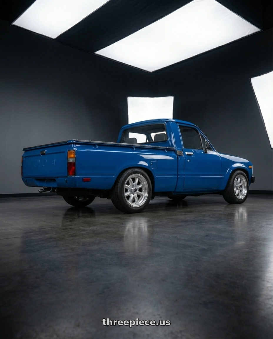 1984 Toyota pickup  with Enkei Compe 4x130 15x5.5+17 Silver wheels rear three quarter view slight stretch tires