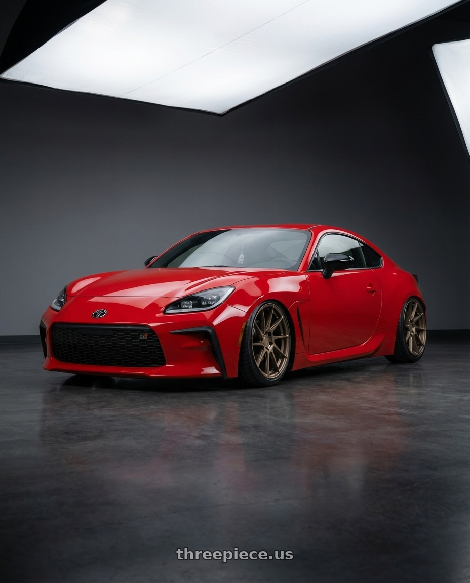 2024 Toyota GR86 with Aodhan AH09 5x114.3 18x9.5 +35 Matte Bronze wheels front three quarter view stanced stance