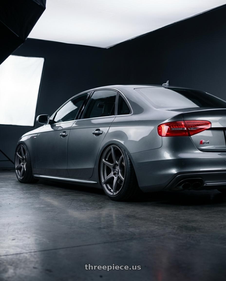2015 Audi S4 B8.5 with Kansei K11G Tandem 5X112 19x9.5 22 Gunmetal wheels rear three quarter view slight stretch tires