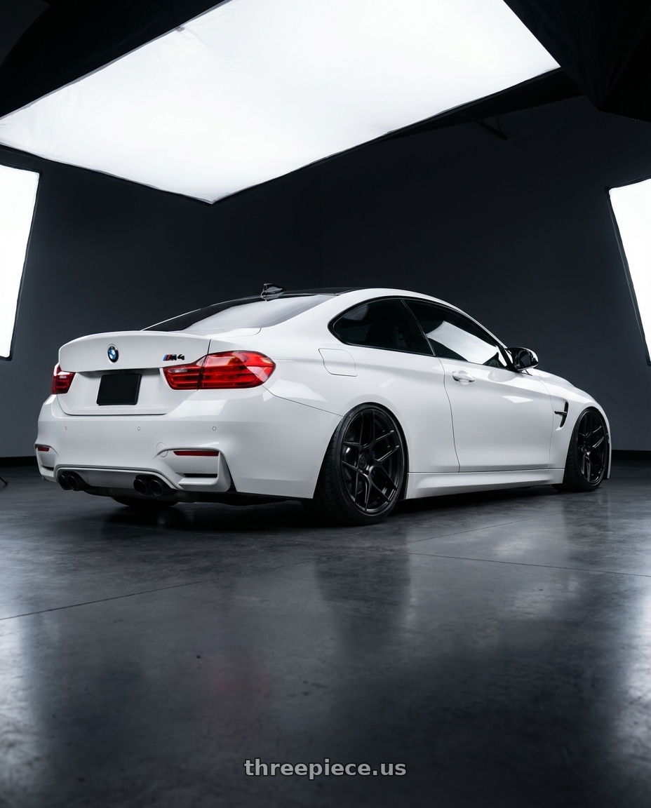 2018 BMW M4 F82 with Aodhan AFF2 5x120 19x9.5+35 Matte Black wheels rear three quarter view slight stretch tires
