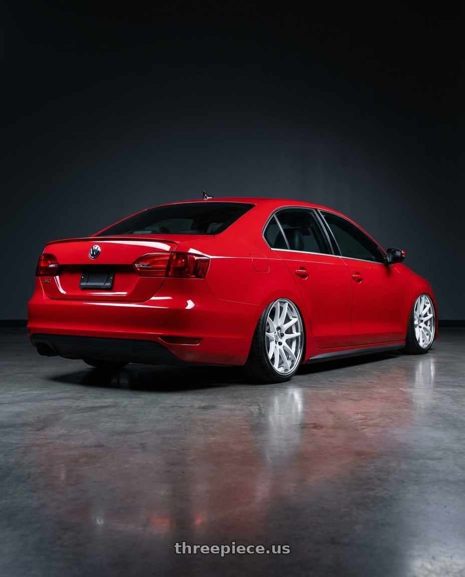 2012 Volkswagen Jetta, GLI, tornado red with Work Cr 2P 5x112 18x8.5 +0 Gloss White wheels rear three quarter view slight stretch tires