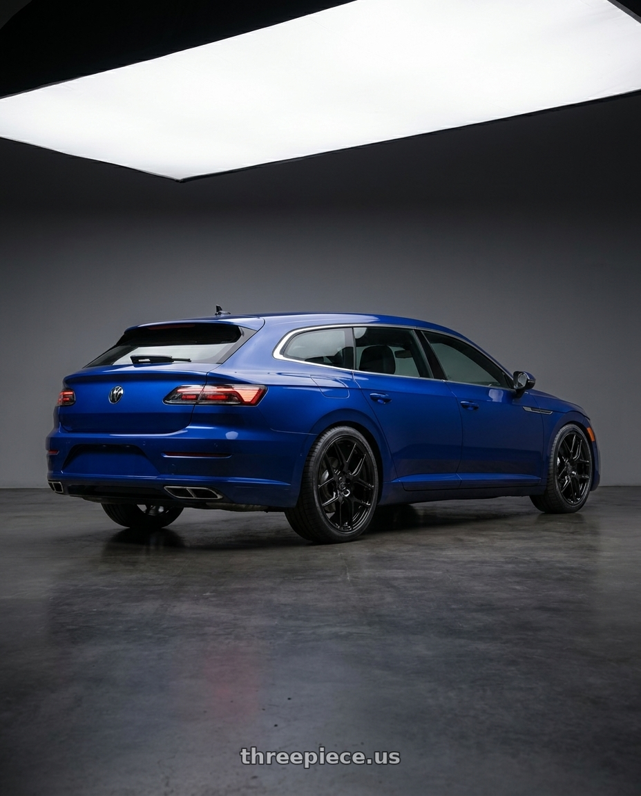 2022 Vw Arteon Shooting Brake Lapiz Blue with MRR FS1 5x112 18x8.5  +25 Gloss Black wheels rear three quarter view square tires