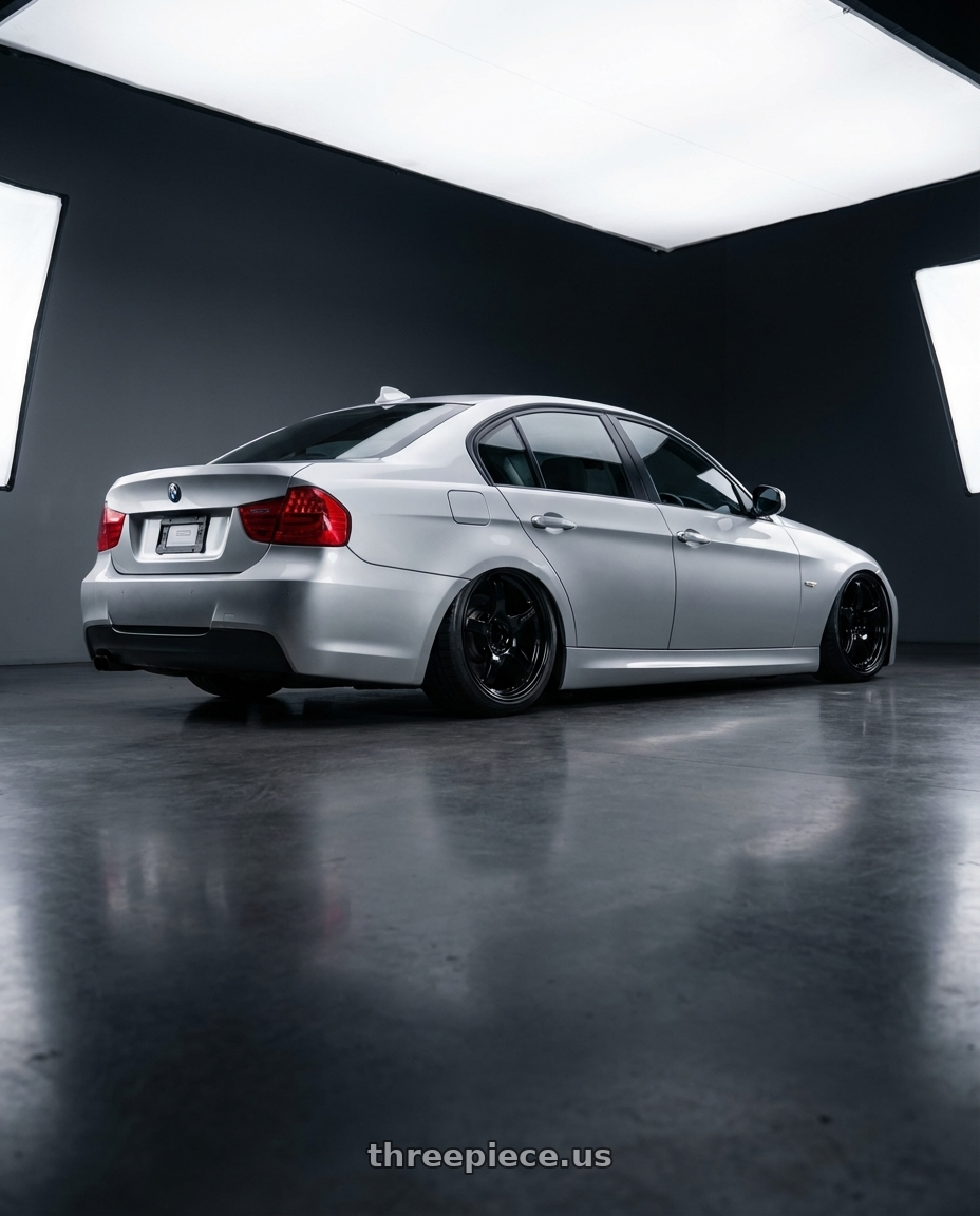 2012 BMW 3 Series E92 with Gram Lights 57CR 5x120 19x9.5+25 Glossy Black wheels rear three quarter view slight stretch tires