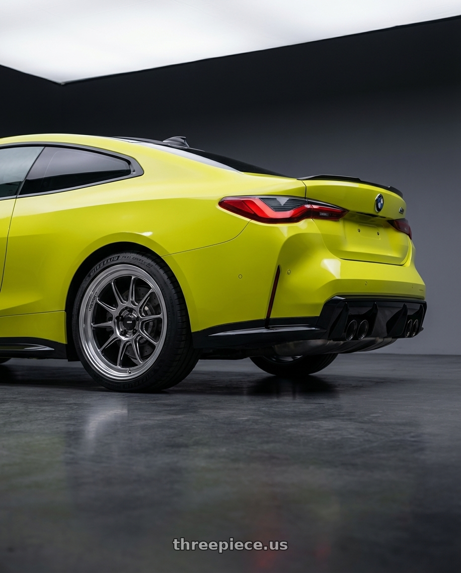 2024 BMW M4 G82 with Konig Countergram 5x112 19x8.5+43 Hyper Chrome / Machined Lip wheels rear three quarter view square tires