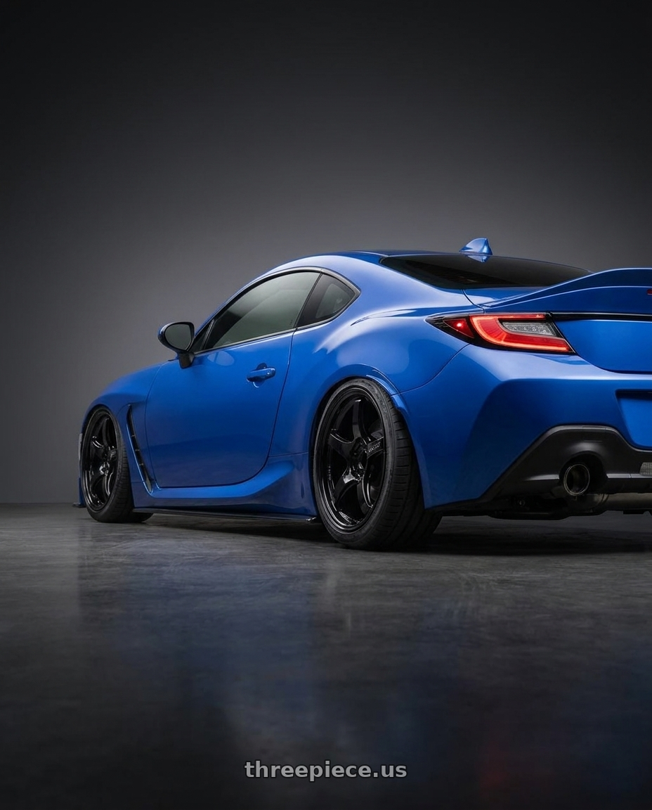 2024 Subaru BRZ with Gram Lights 57CR 5x114.3 18x8.5+37 Glossy Black wheels rear three quarter view slight stretch tires