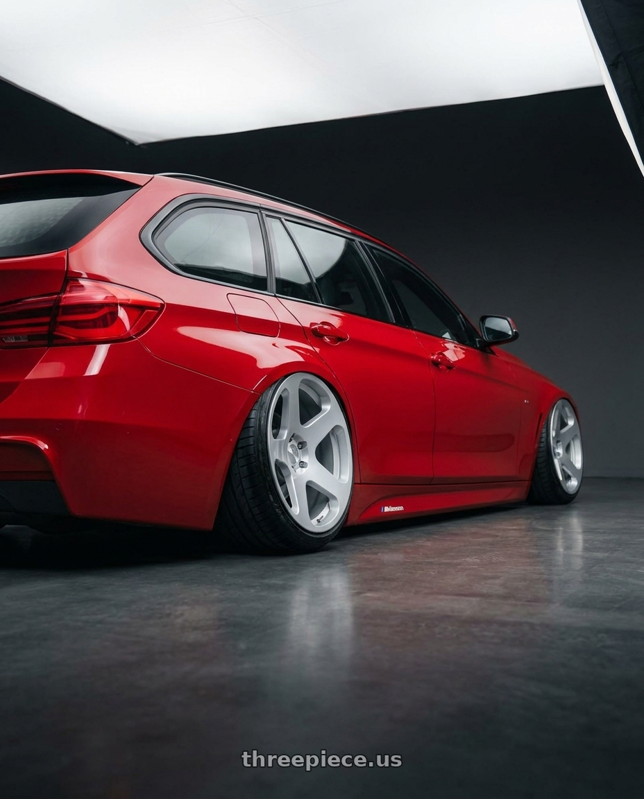 2016 BMW 335D touring with Rotiform RC200 NUE 5X120 20x10 +40 GLOSS SILVER wheels rear three quarter view meaty tires
