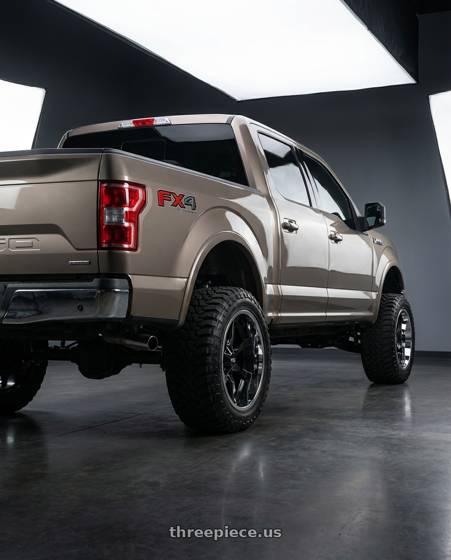 2019 Ford F-150 with Moto Metal MO201 6X135/6X139.7 22X12 -44 GLOSS BLACK MILLED CENTER CHROME LIP wheels rear three quarter view meaty tires