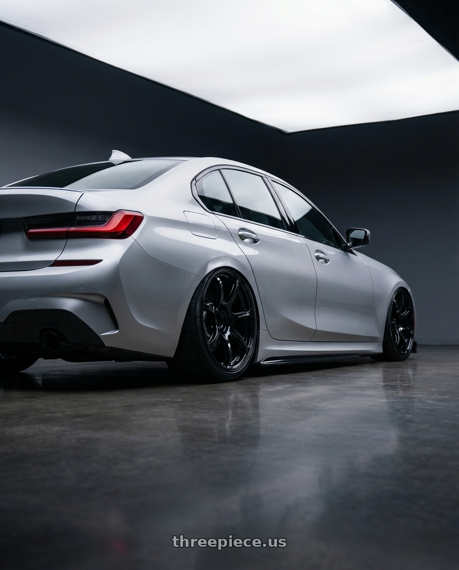 2023 BMW 3 Series G20 with Advan RGIII 5x112 19x8.5+45 Gloss Black wheels rear three quarter view slight stretch tires